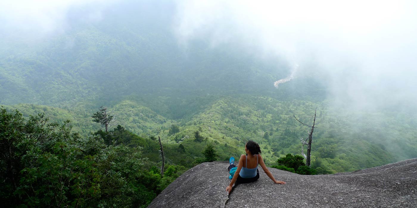 satoko-sitting-on-rock