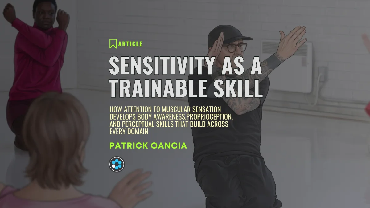 Article banner reading Sensitivity as a Trainable Skill by Patrick Oancia, set against a soft-focus studio photograph of a Baseworks practice session.