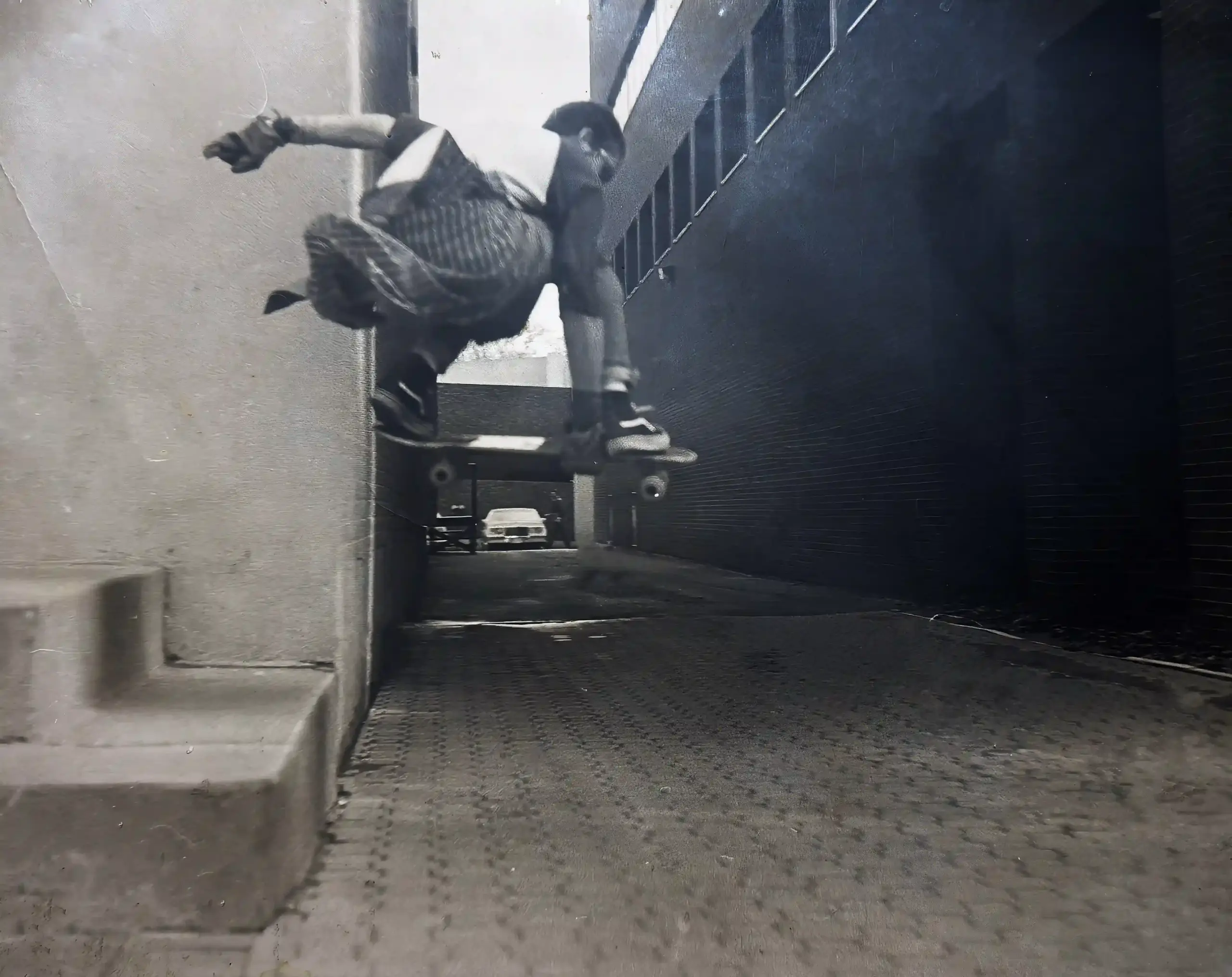Patrick Oancia skateboarding in an alleyway in Fredericton, New Brunswick, 1983.